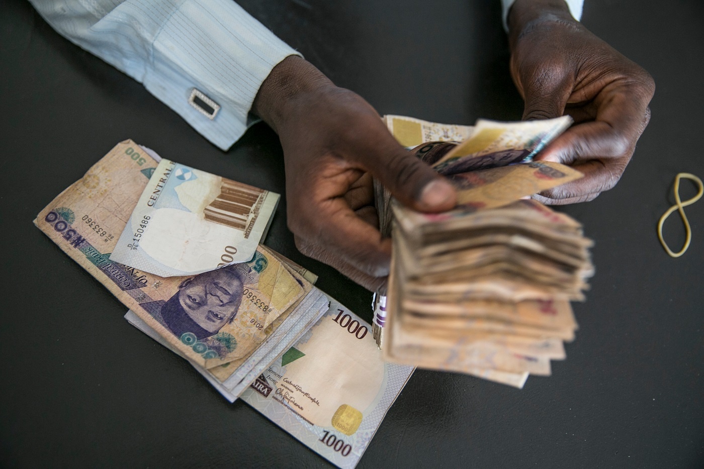 devalue naira