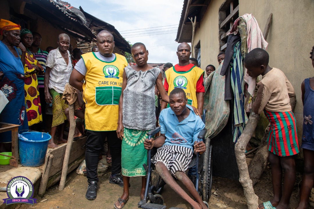 Onyebuchi Udoka Wheelchair to Flood-Displaced Person
