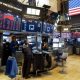 US markets give back ground