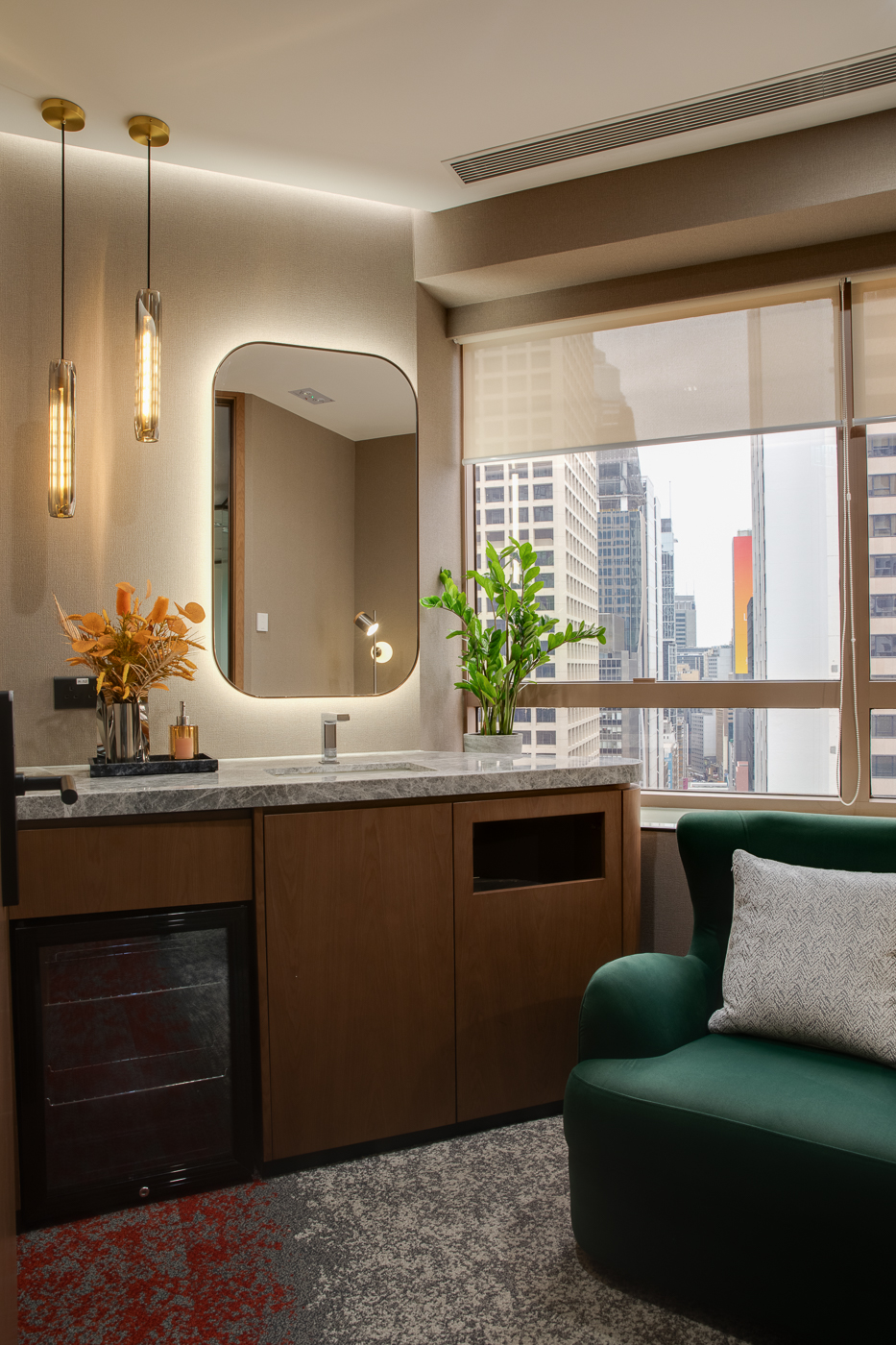 Various amenities, including the pantry (left) and wellness room (right), are thoughtfully designed to enhance the well-being of office workers