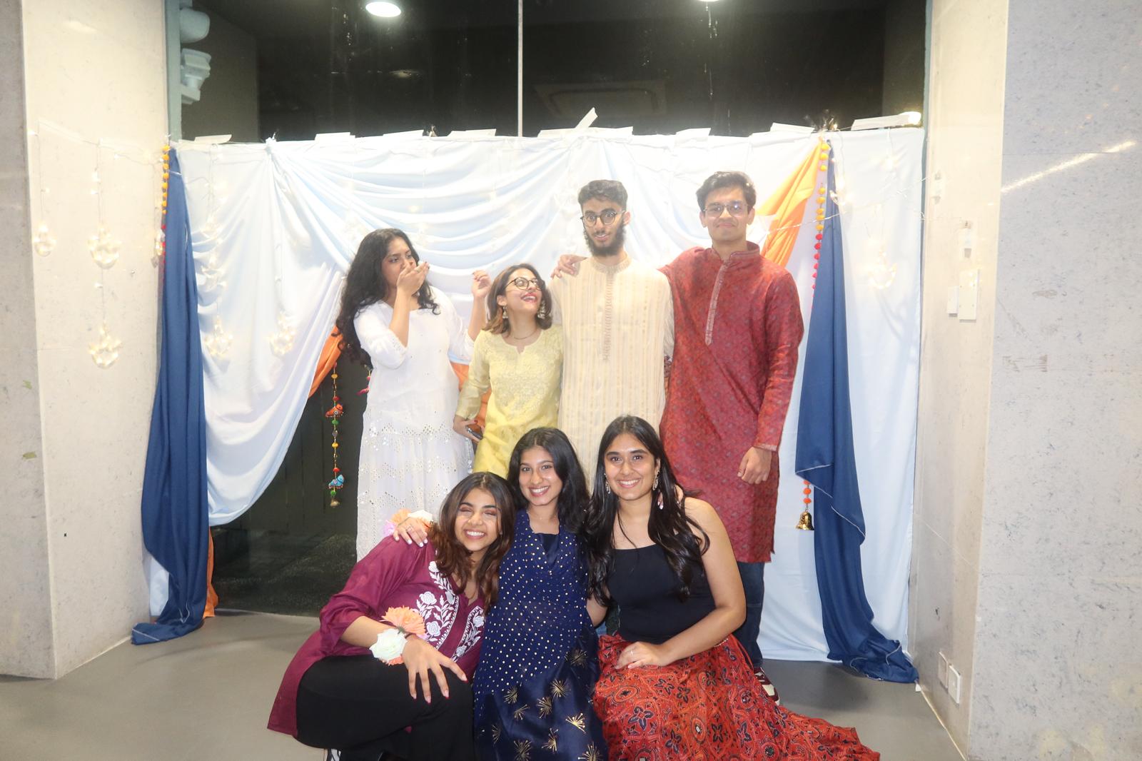 Sansita DEWANI (Bottom left) embraces CUHK's multicultural spirit during a campus cultural celebration, where students from diverse backgrounds share their heritage and forge lasting friendships.