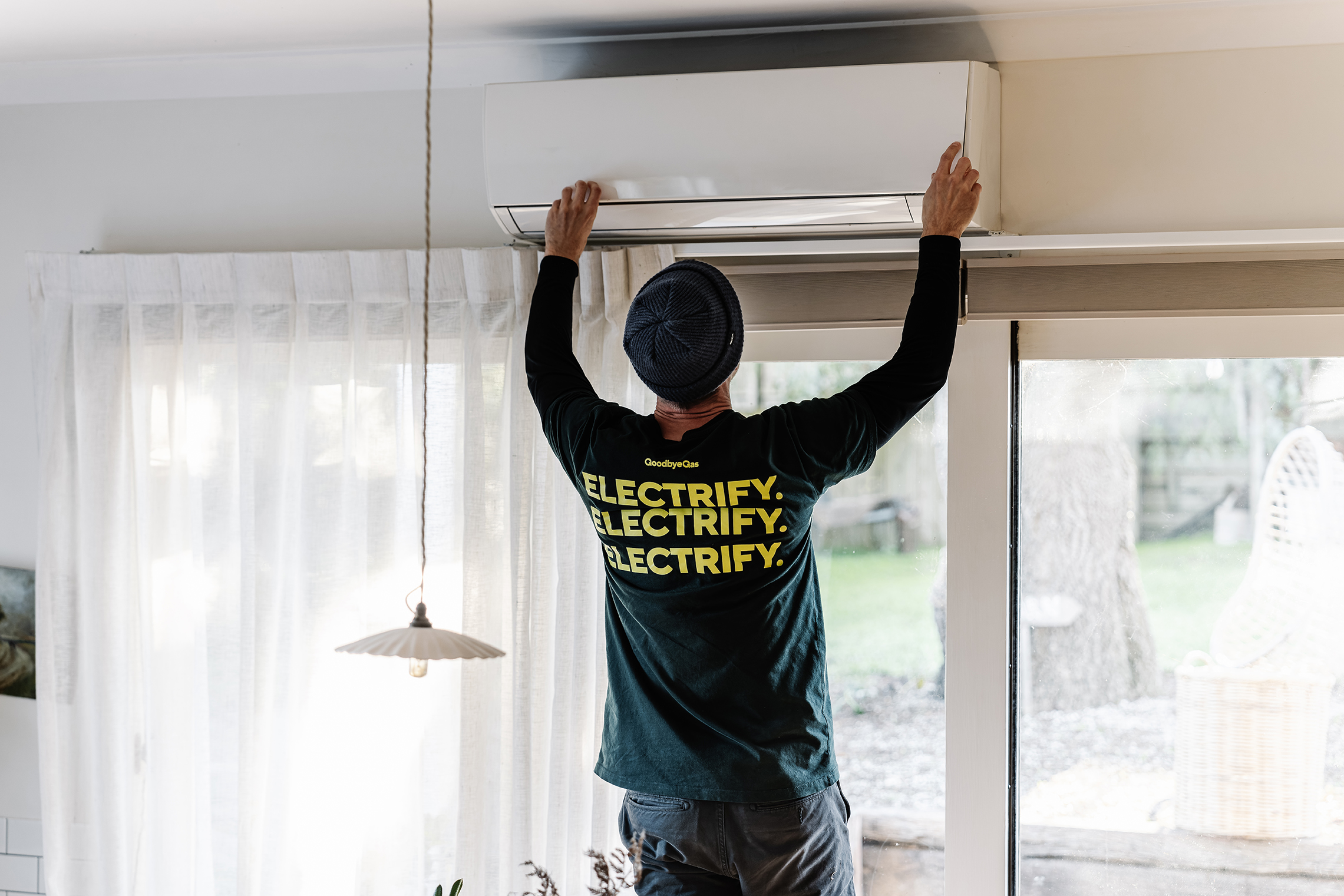 Installation of an electric split-system for heating and cooling.