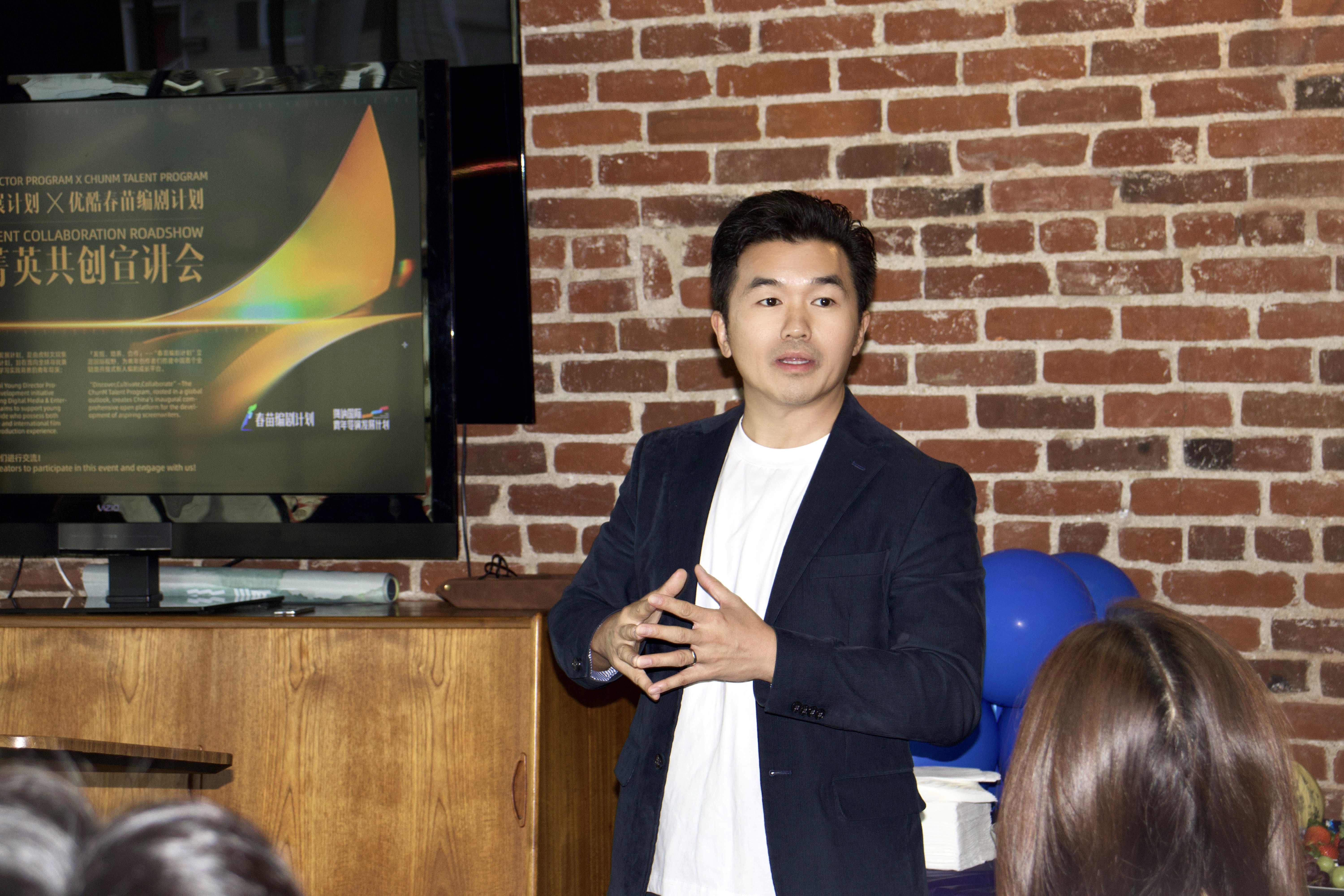 Joe Zheng, International Development Consultant, Hina International Young Directors Program, speaks at the summit